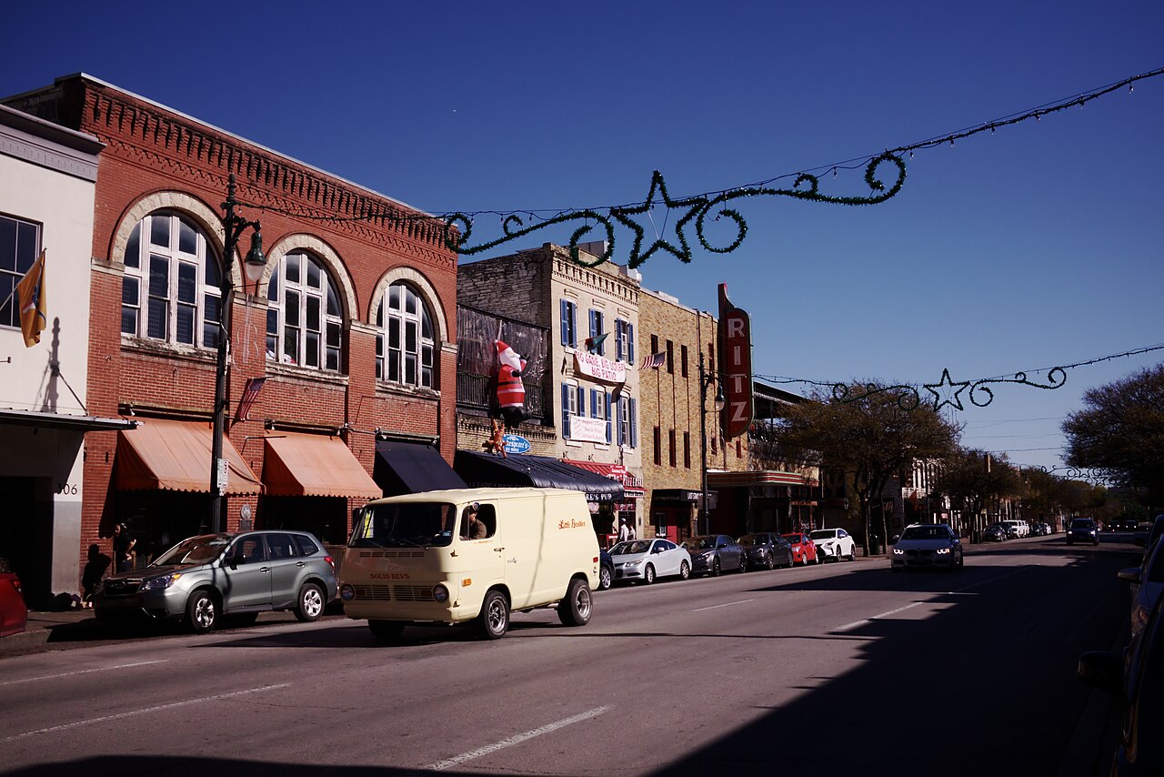 Downtown Austin street scene with mixed historic and modern buildings