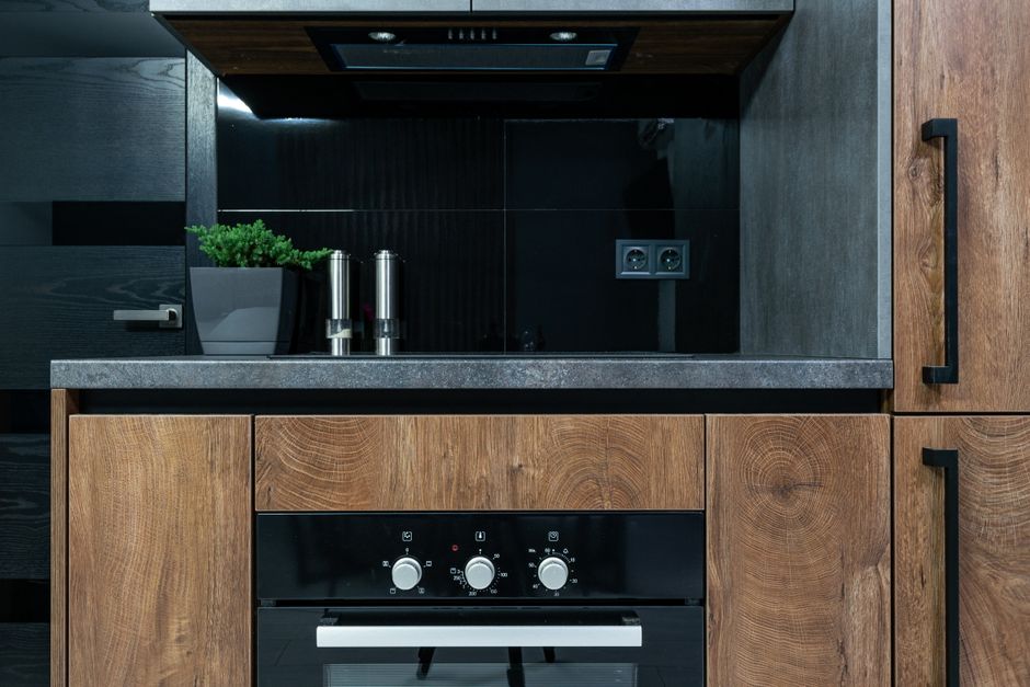 Bright modern kitchen with island, indicating updated move-in-ready interior