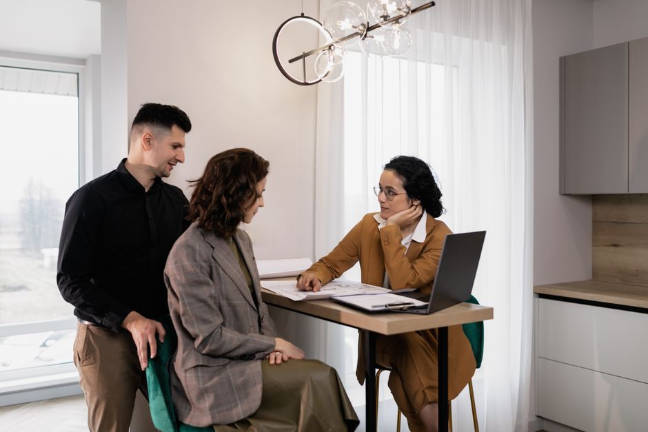 Property manager reviewing a portfolio report with an owner