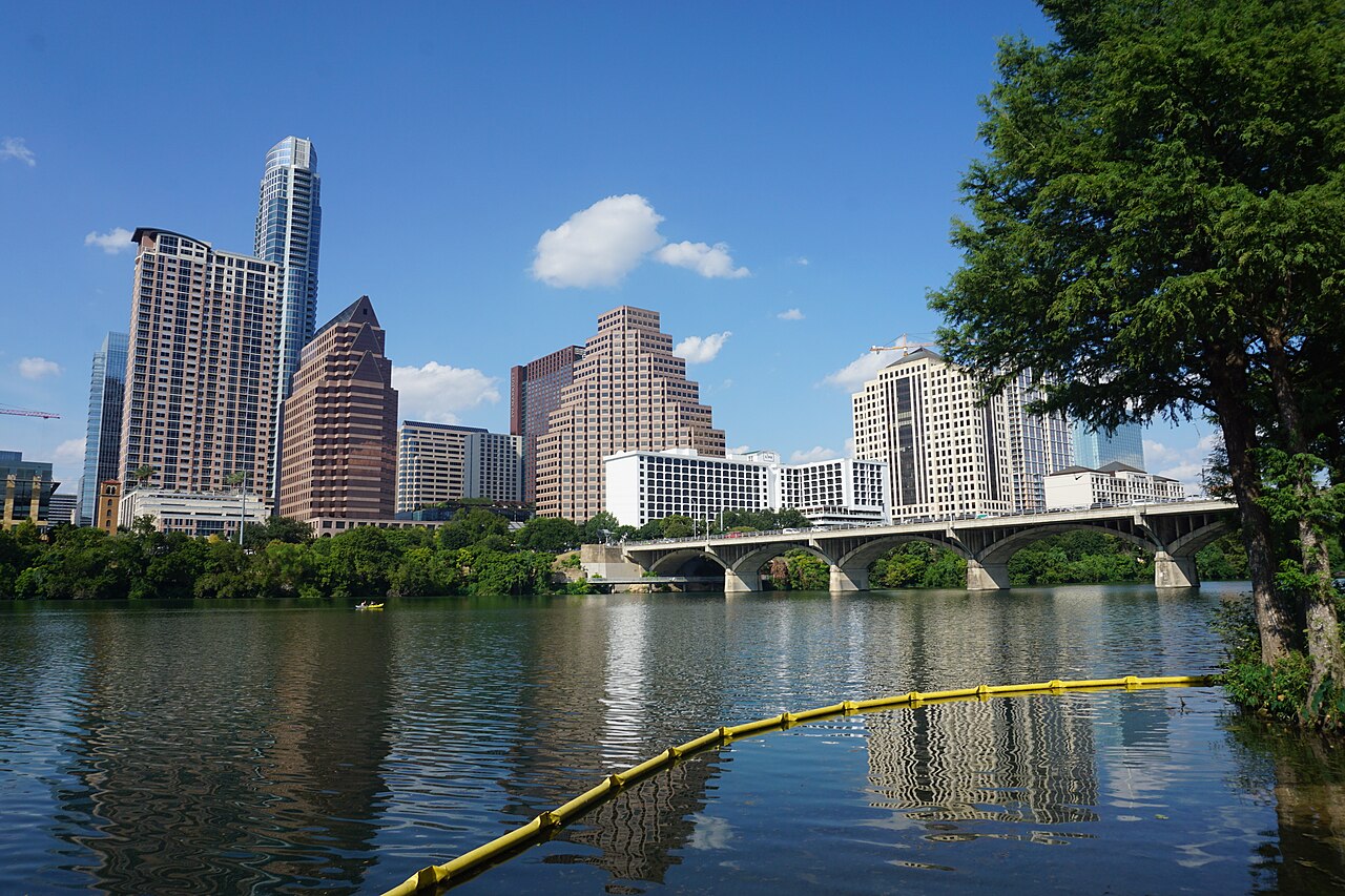 Aerial-style view of downtown Austin skyline and Lady Bird Lake