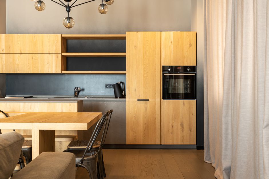 Updated kitchen interior with quartz counters and stainless appliances