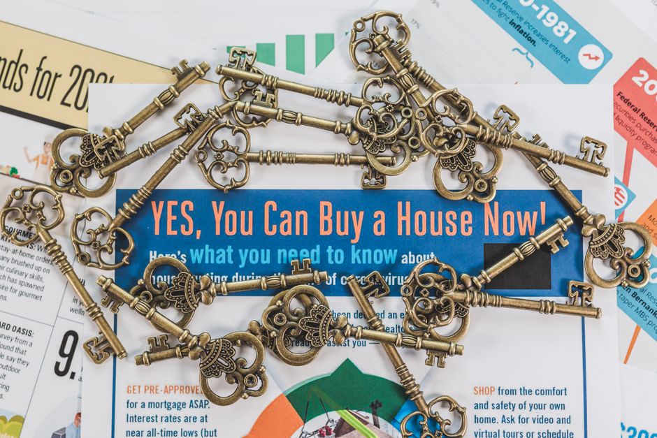 New homeowner receiving house keys at closing